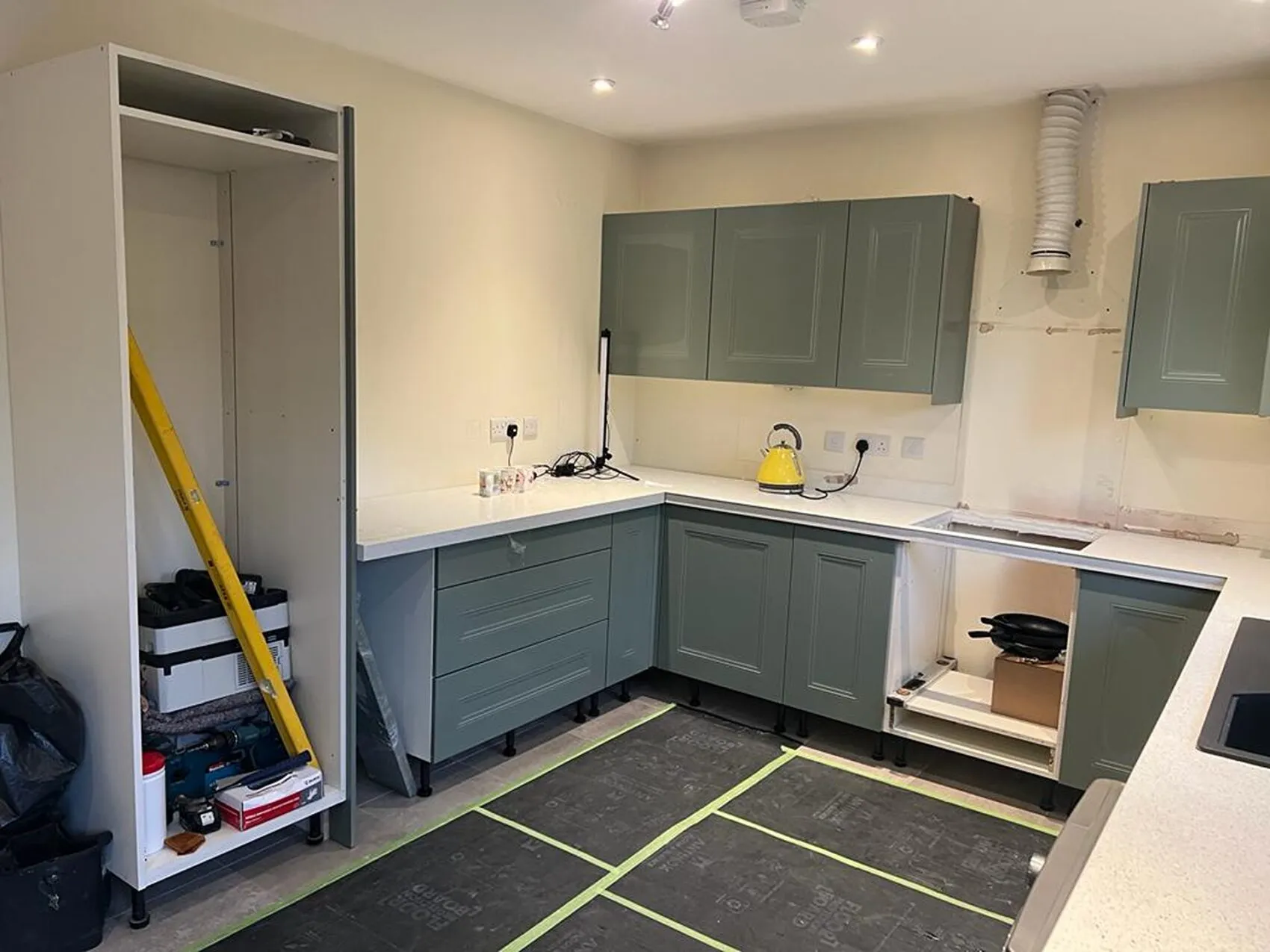 Rustic kitchen painting Ottawa - wooden cabinets, farmhouse sink, traditional style renovation